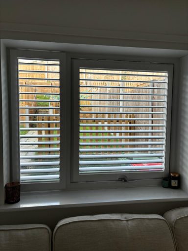 Bespoke perfect fit plantation shutters in Market Drayton living room | Style enhancement by ShireLuxe Shutters Shropshire