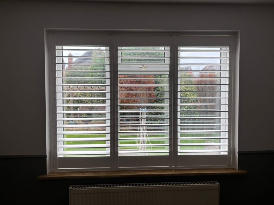 Real wood plantation shutters in elegant Leegomery dining room Telford | Natural warmth & privacy by ShireLuxe Shutters Shropshire
