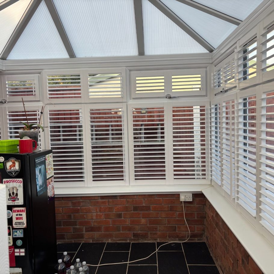 Perfect Fit Shutters on Shropshire Conservatory Seamless perfect fit shutters in light-filled Shropshire conservatory | Energy-efficient luxury from ShireLuxe Shutters