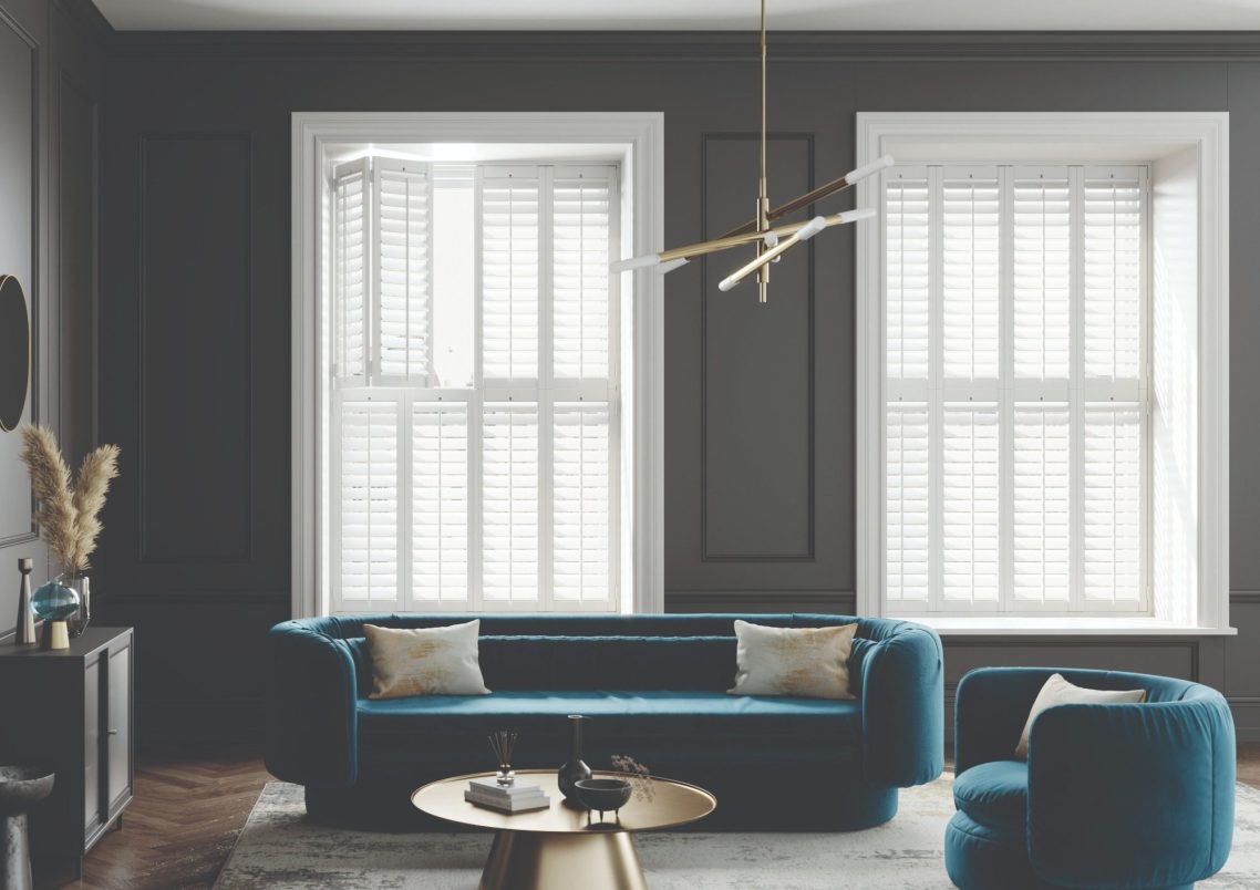 Tier on tier plantation shutters in Shropshire living room window | Flexible light & privacy by ShireLuxe Shutters